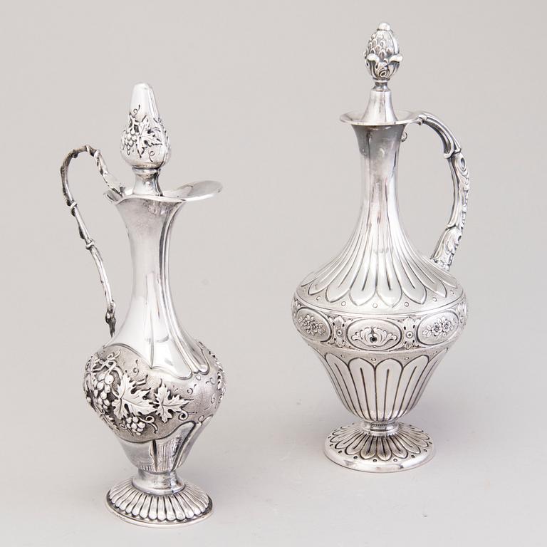 Two silver wine jugs, one with Italian marks, both with Finnish import marks from the early 1970s.