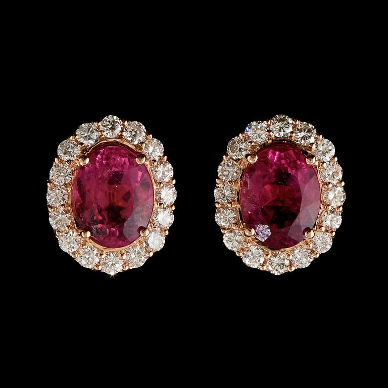 A pair of toumaline, circa 5.69 cts, and diamond, total circa 1.53 cts, earrings.