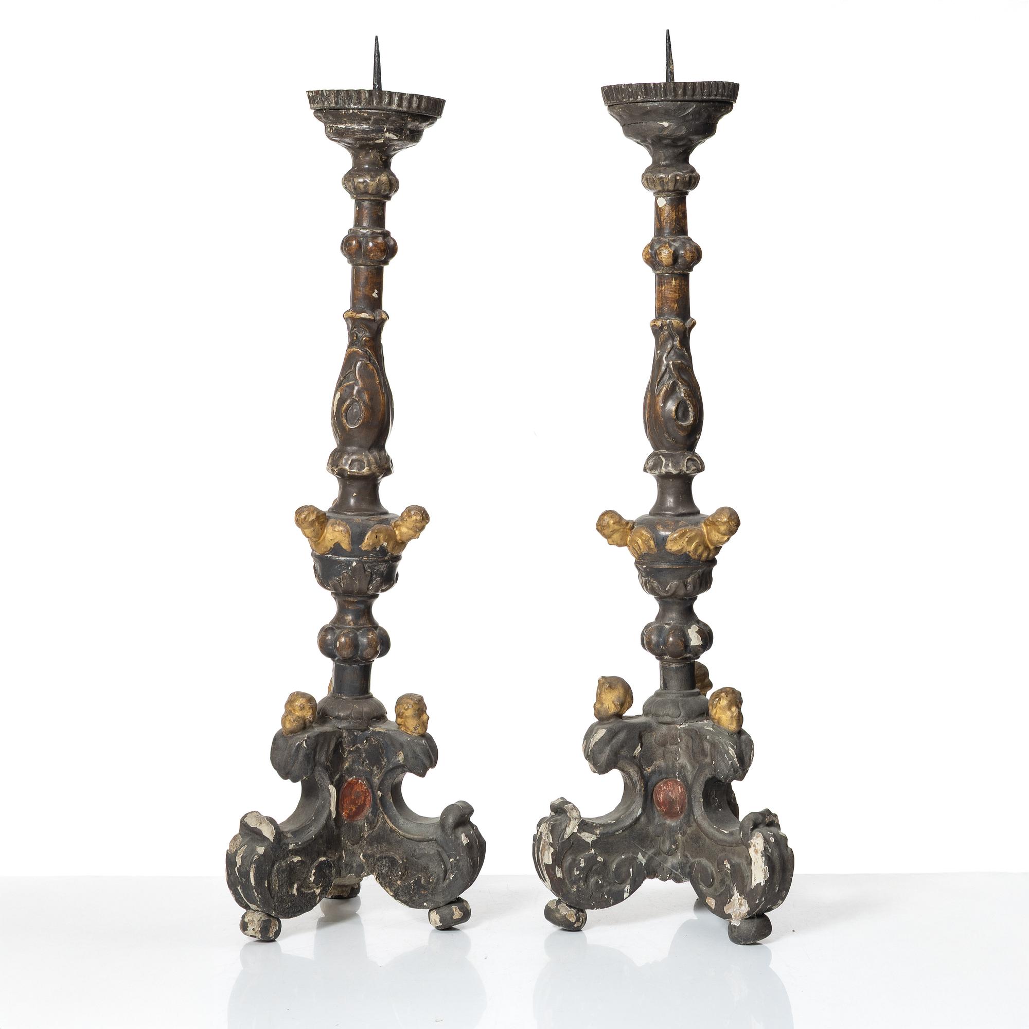 A pair of Baroque style candleholders, 19th Century.