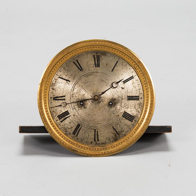 A mid 19th Century Biedermeier wall clock.