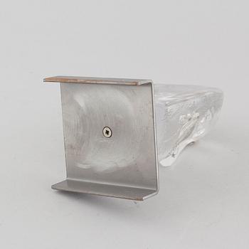 a glass object, signed.