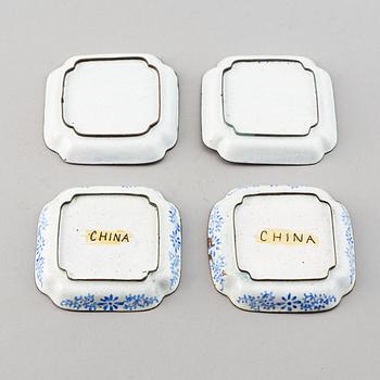A set of 23 enamel on copper dishes, China, early 20th Century.