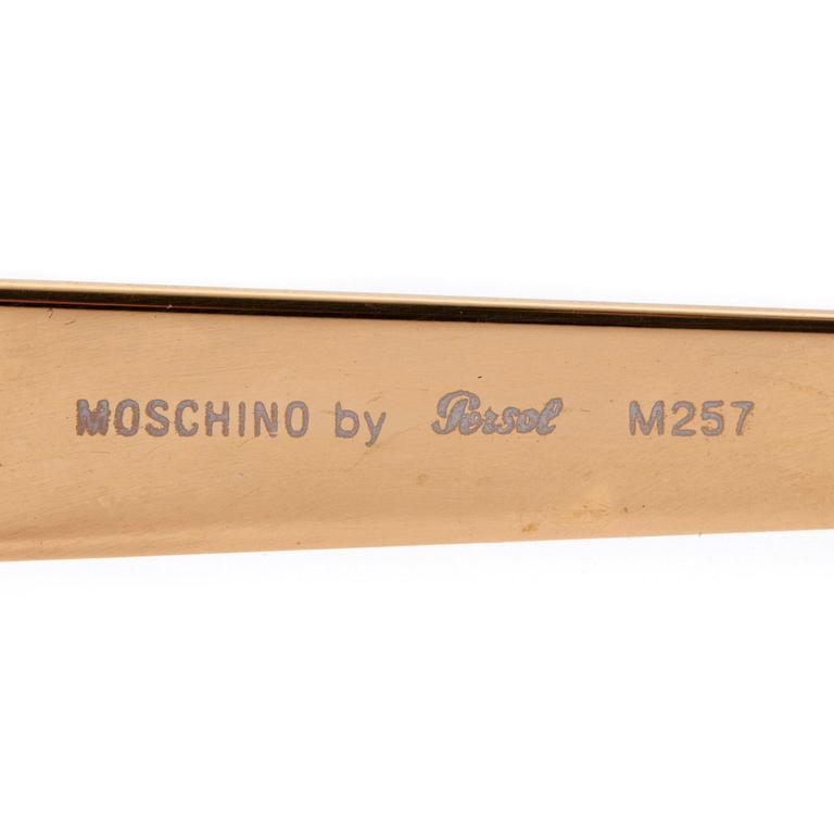 MOSCHINO, a pair of sunglasses.