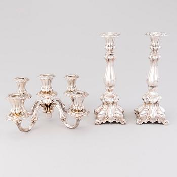 CANDELABRUM AND CANDLESTICK, silver, Kultakeskus Oy, Hämeenlinna, 1965 and 1975.
