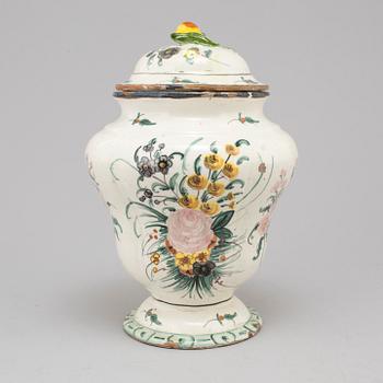 A 20th century urn and lid.