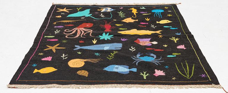 A hand-embroidered Kilim rug, c. 200 x 155 cm.