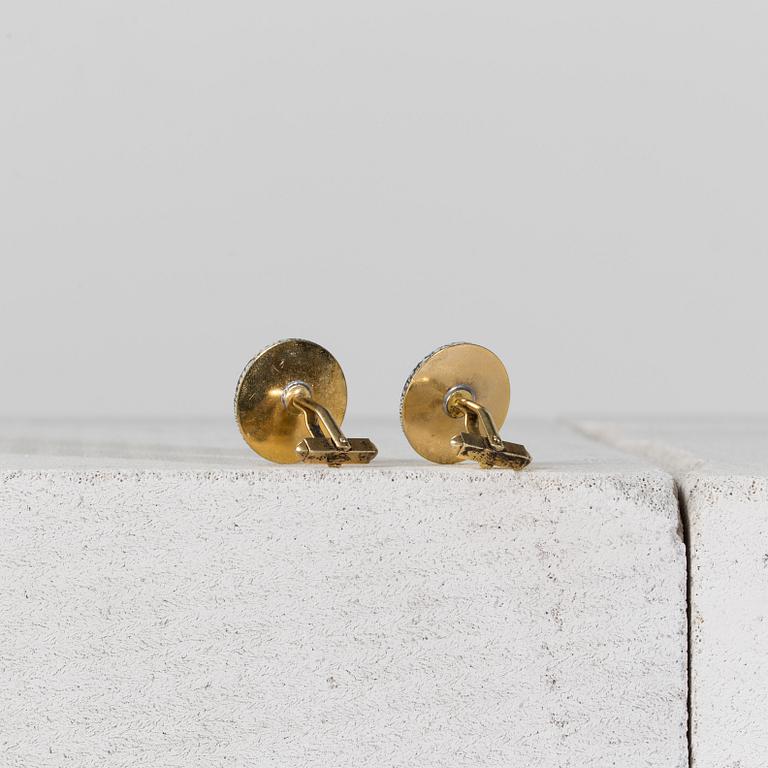 MANSCHETTKNAPPAR, ett par, Fornasetti.