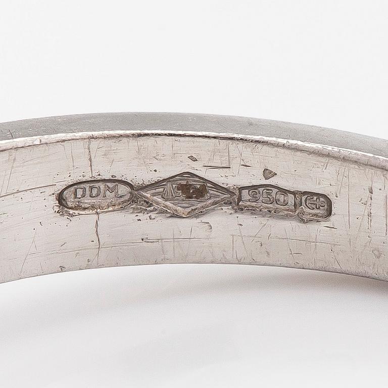 A platinum ring, with a brilliant-cut diamond approximately 3.10 ct. Domino Jewellery, Birmingham, England.