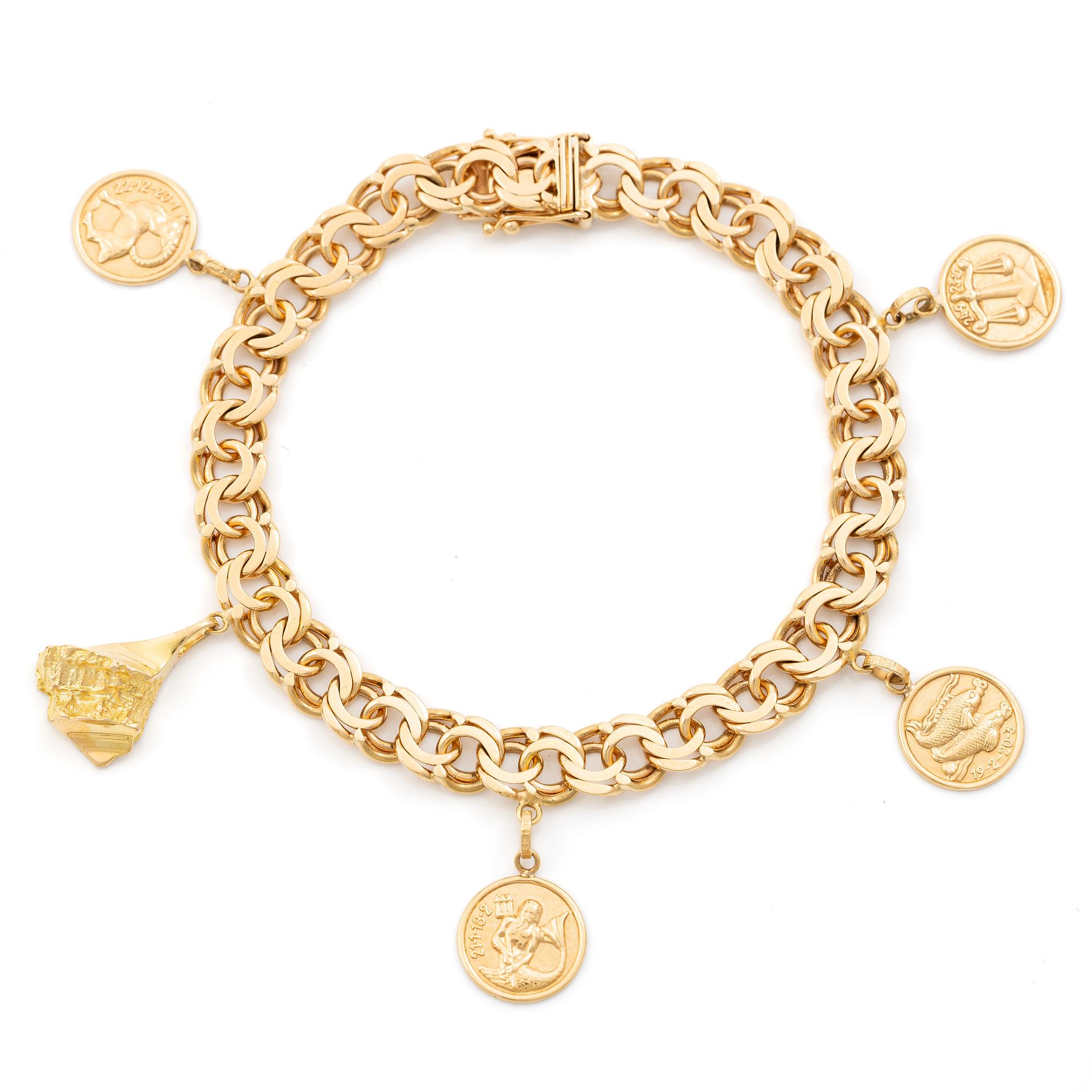 Bracelet, 18K gold, with charms including zodiac signs.