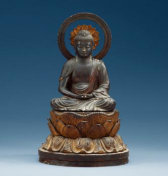 1481. A Japanese gilt lacquer figure of a seated Buddha with his hands in Dhyana Mudra on a double lotus throne, 19th Century.