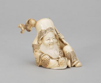 A Japanese ivory okimono figure of Sholaou, Meiji period.