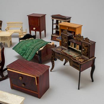 Circa 66 pieces of doll furniture with various accessories, ca 1900 and early 20th century.