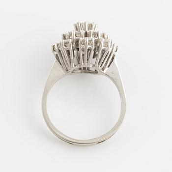 14K white gold and brilliant cut diamond cluster ring.