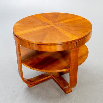 An Art deco style walnut coffee table alter part of the 19th century.