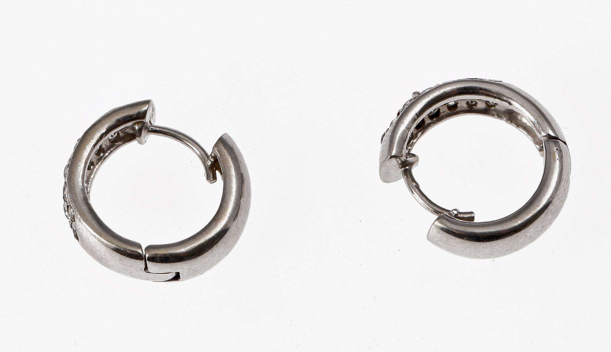 EARRINGS, 14 K white gold with brilliant cut diamonds, tot 1.14 ct.