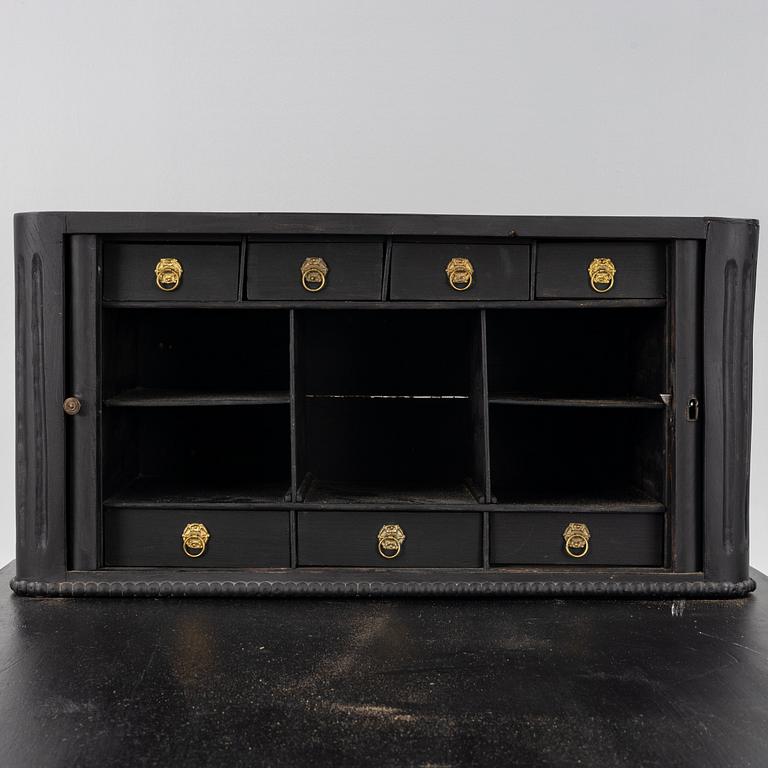 A gustavian style painted desk, circa 1900.