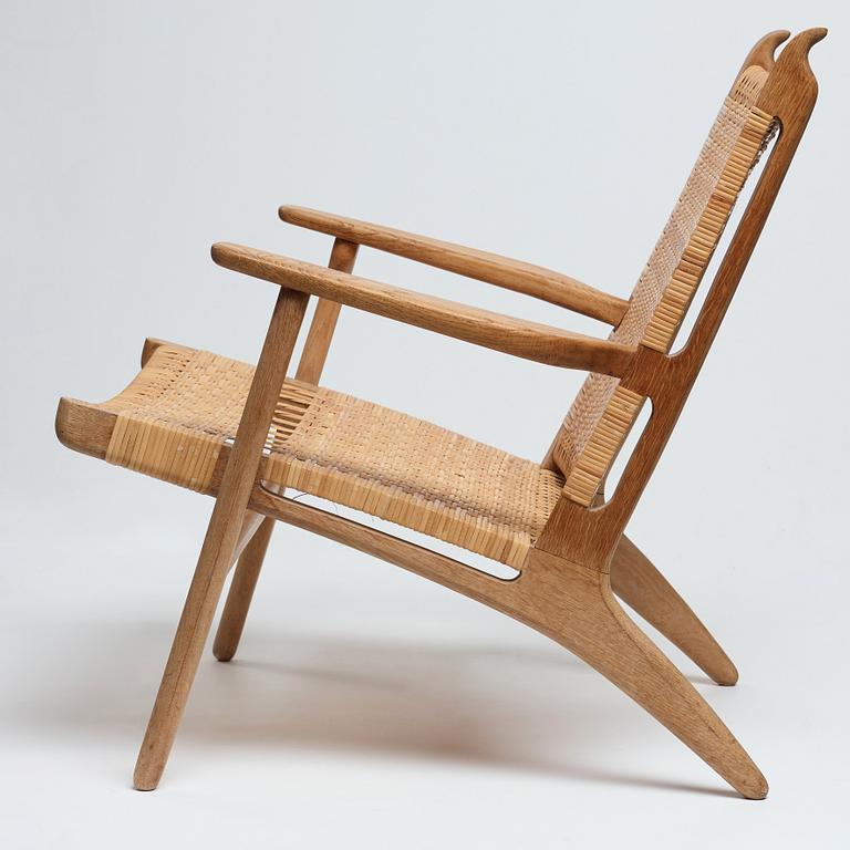 Hans J. Wegner, an oak "CH-27" easy chair, Carl Hansen & Son, Denmark, 1950-60's.