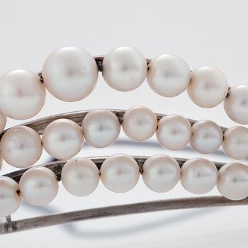 A TIARA with cultured pearls and a detachable brooch set with old-cut diamonds.