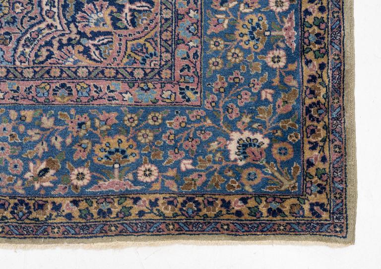 A semi-antique Kerman carpet, figural, c. 371 x 285 cm.