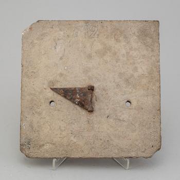 An 18th century limestone sundial.