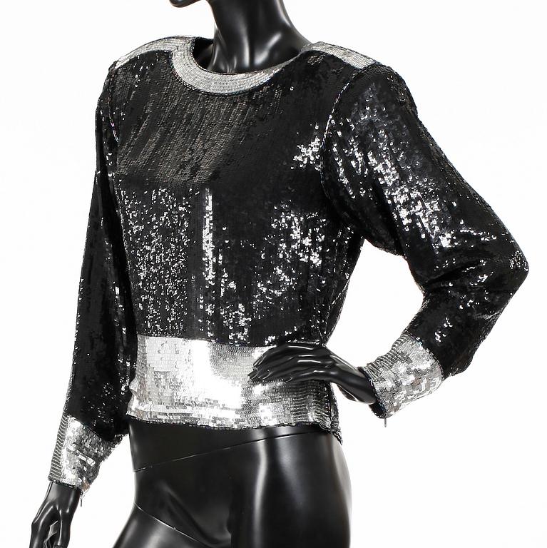 YVES SAINT LAURENT, top, 1985-86.