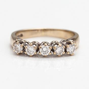 An 18K gold ring with diamonds ca. 0.40 ct in total. Harri Lahtinen, Helsinki 1988.