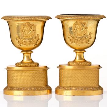 A set of three French Empire early 19th century gilt bronze centre pieces.