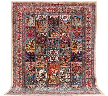 A Kashmar carpet, c. 387 x 297 cm.