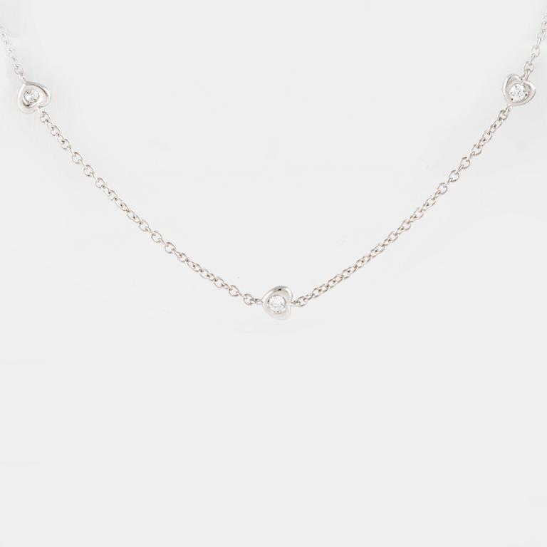 COLLIER, 18K vitguld med 10 briljantslipade diamanter ca 0.25 ct. Vikt 3,3 gram.