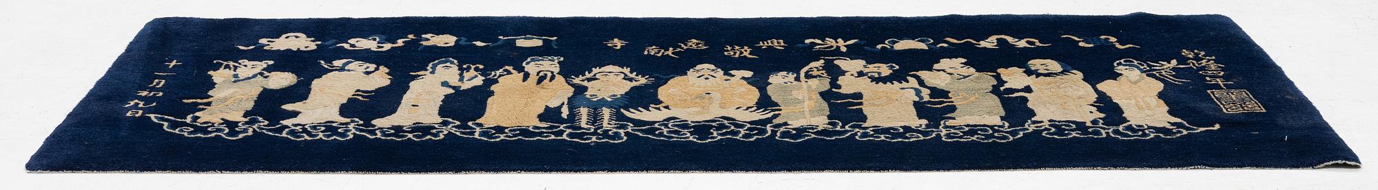 A Chinese 'immortals' carpet, Baotou, Measure: approx. 75 x 185 cm.