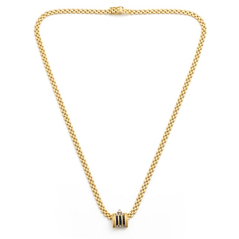 Collier 18K guld med avtagbart hänge 18K guld med små diamanter och blå stenar sannolikt safirer.