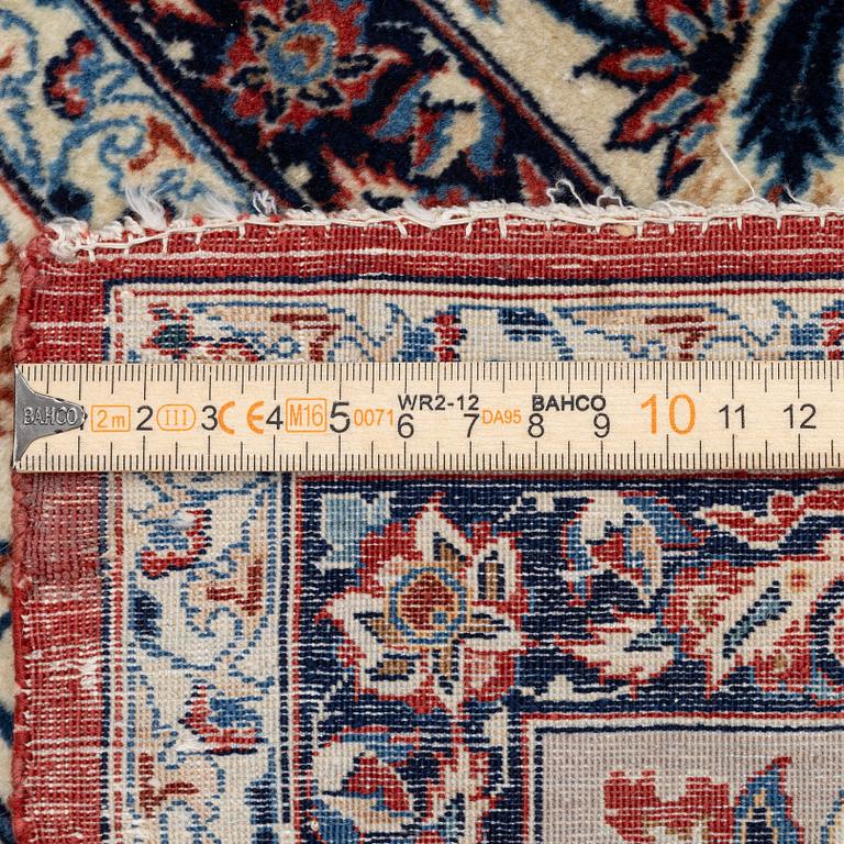 A semi-antique Isfahan rug, Central Persia, signed (Sadegh) Seirafian, c. 237 x 146 cm.