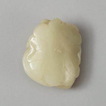 A Chinese nephrite figure, 20th Century.