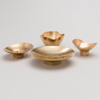 A set of four bowls for Oy Taito Ab.