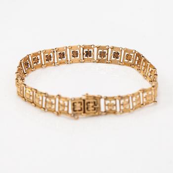A 14K gold bracelet. Kallion kulta ja kello, Helsinki 1926.