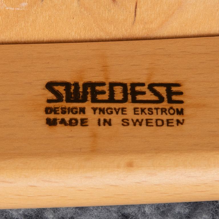Yngve Ekström, armchair set with footstools, "Lamino", Swedese 2014.