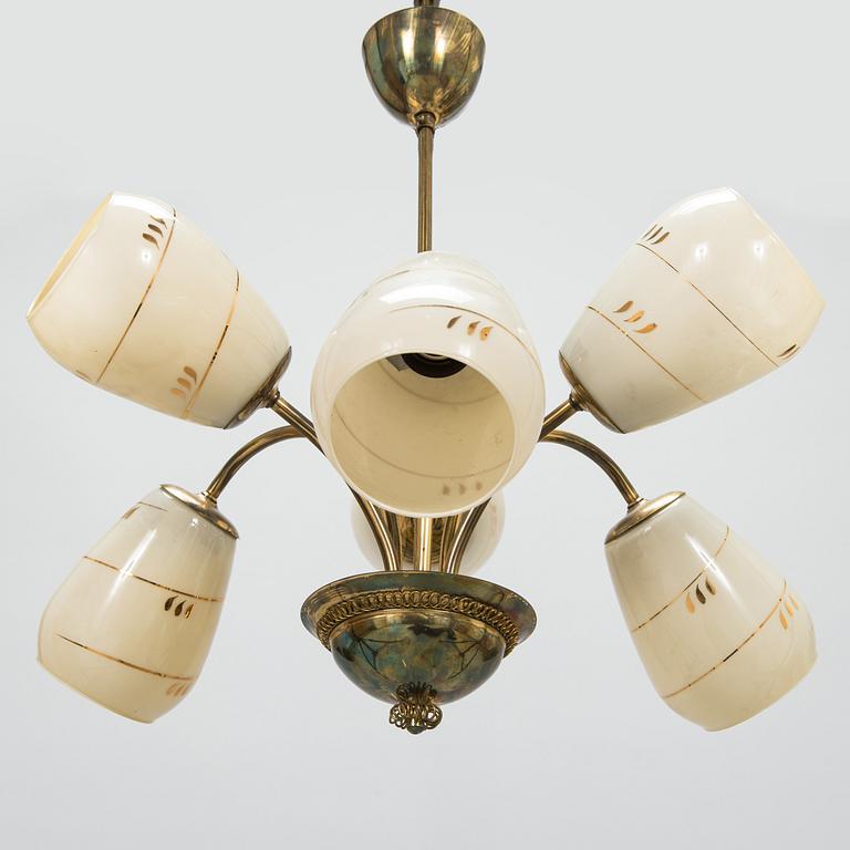 A mid-20th-century brass ceiling light, Finland.