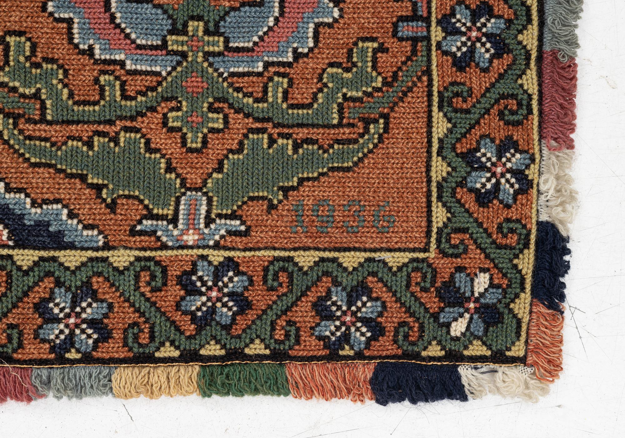 A sleigh cushion, signed BB and dated 1936, c. 160 x 67 cm.