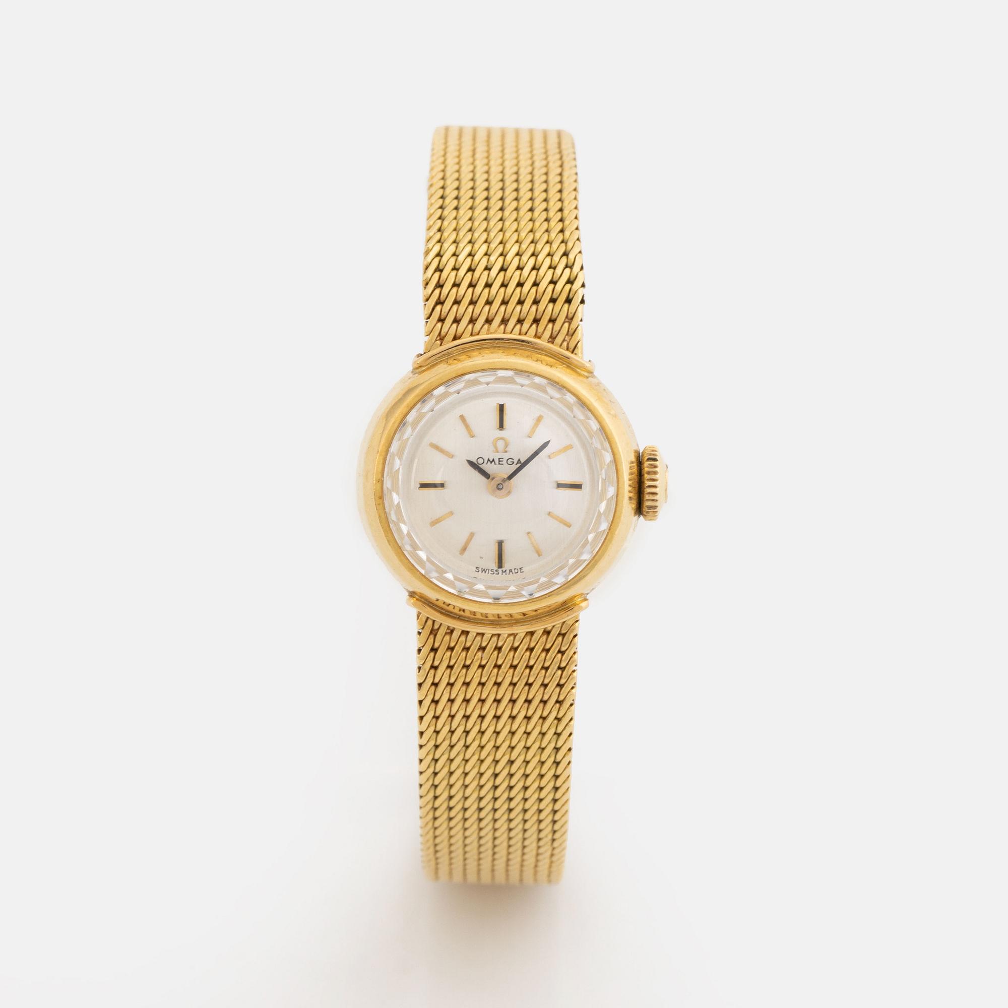 Omega 18K gold ladies watch.