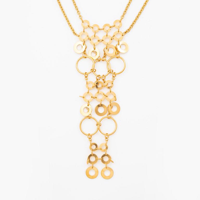 Siv Lagerström two necklaces in yellow metal.