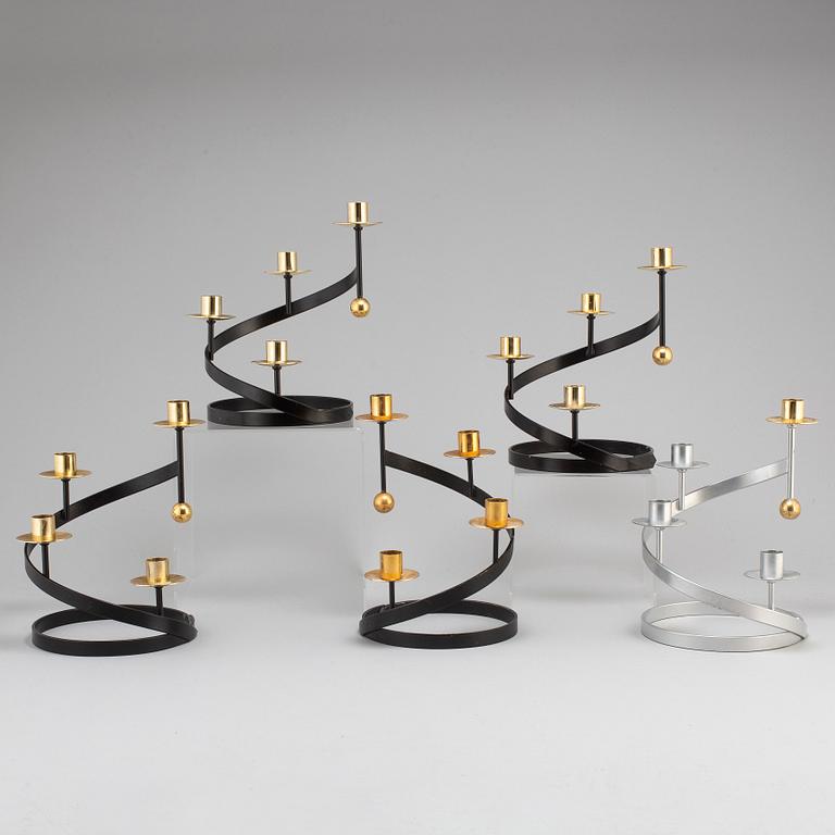 Four plus one 'Sonat' candle holders by Gunnar Ander, Ystad Metall.