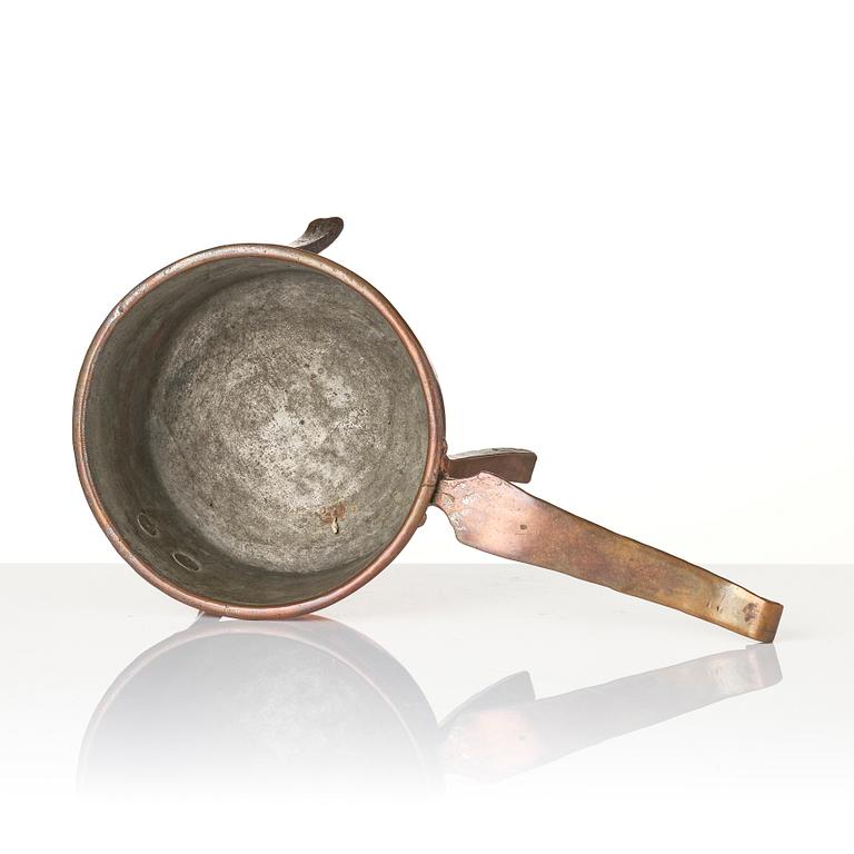 A copper saucepan, 18th century.