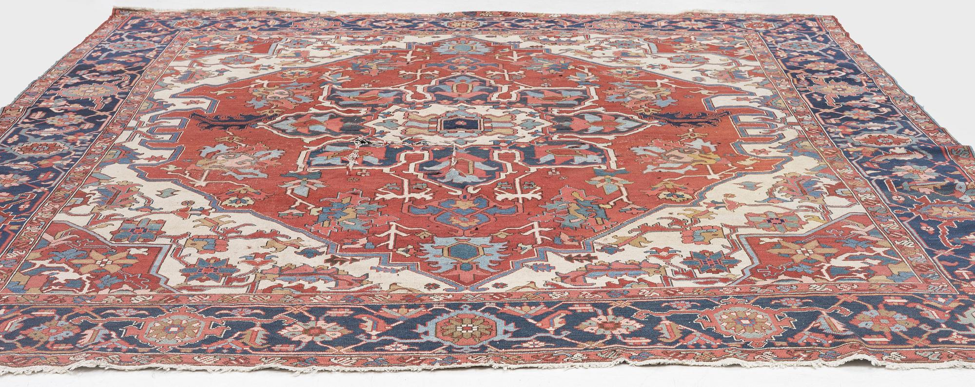 An Antique north west persian carpet, c. 325 x 313 cm.