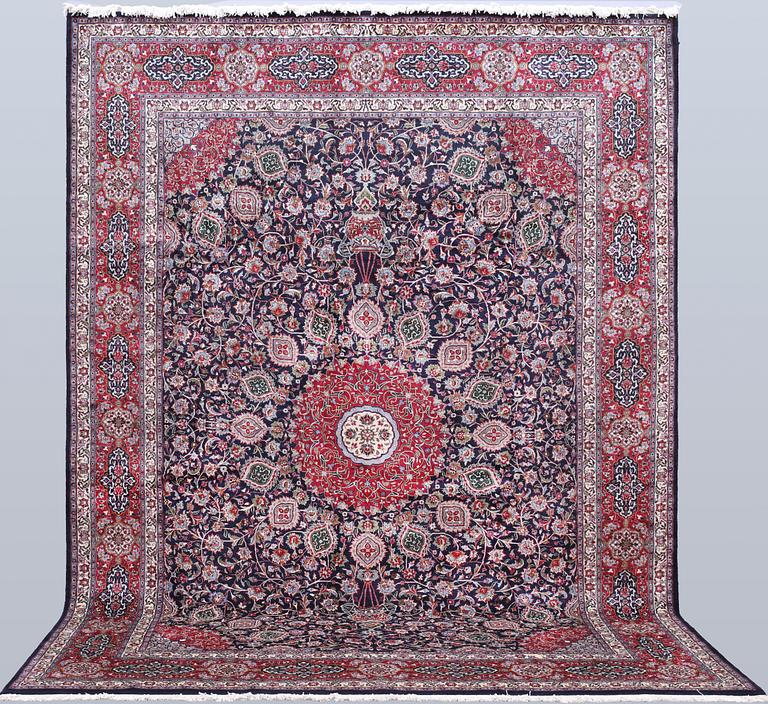 A Kashmar carpet, approx. 406 x 300 cm.