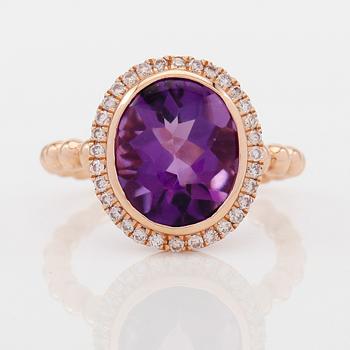 RING, 18K roséguld, diamanter tot ca 0.26 ct. och ametist.