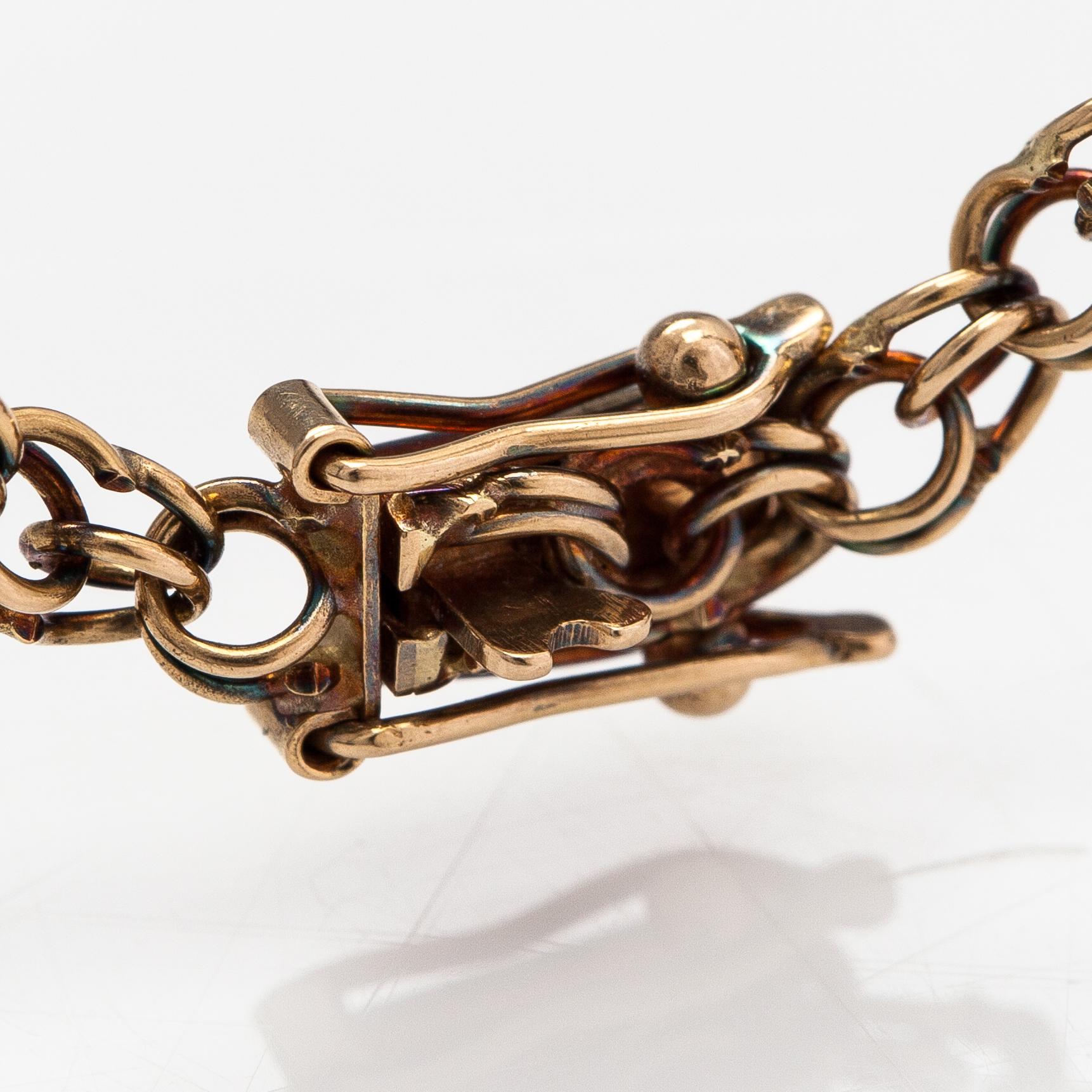 A 14K gold necklace. Aittamäki Ky, Nurmisjärvi 1992.
