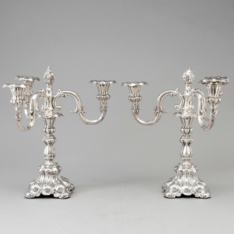 A pair of silver candelabras from CG Hallberg, Stockholm 1935.
