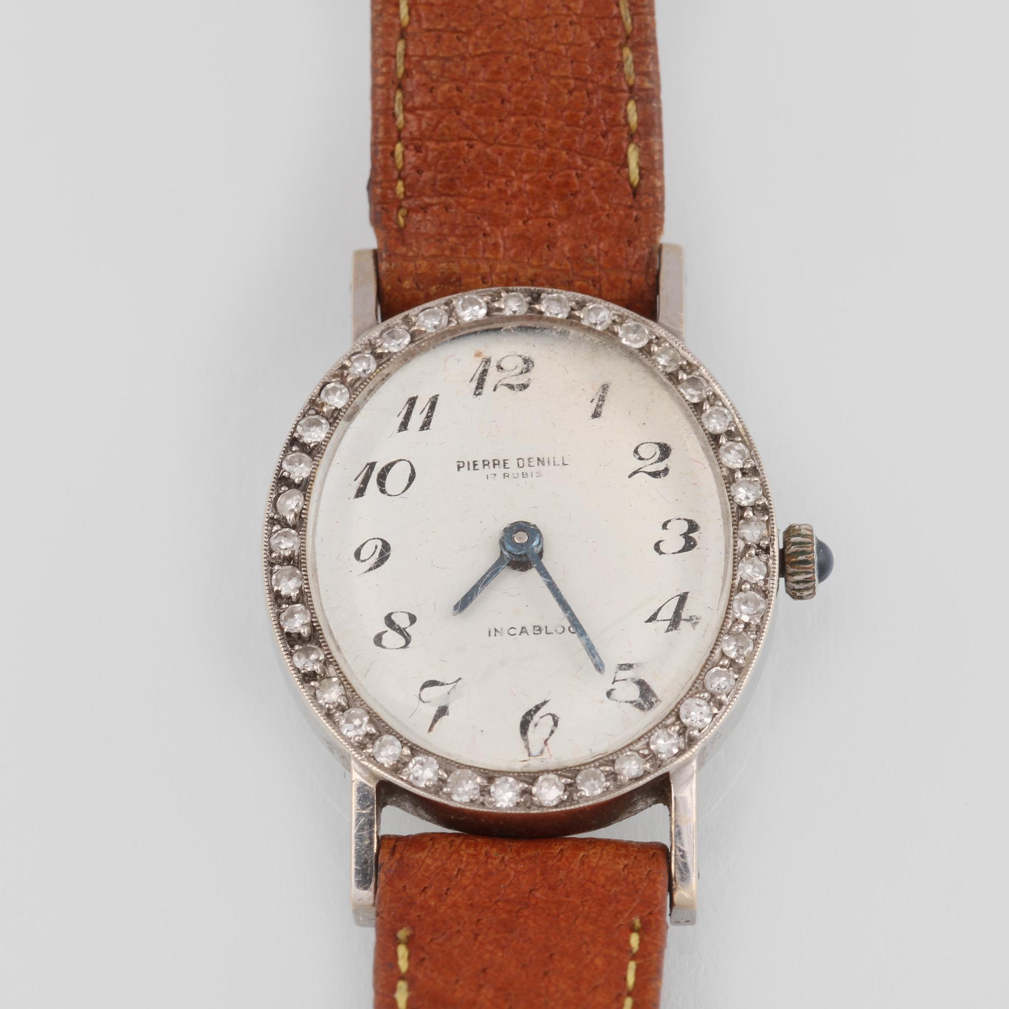 ARMBANDSUR, 18K vitguld med åttkantslipade diamanter,  Pierre Denill, Schweiz.