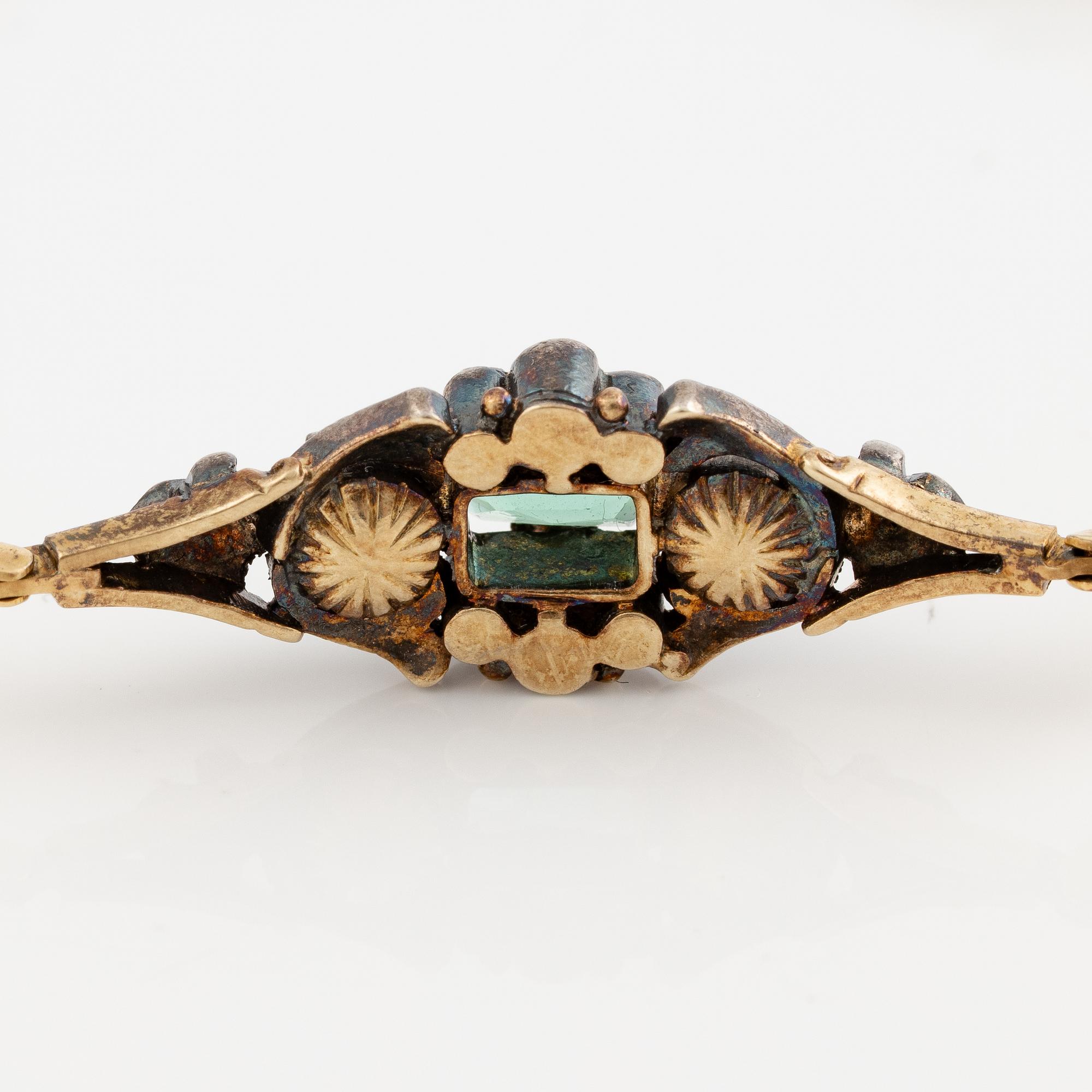 Armband 18K guld och silver med grön turmalin och rosenslipade diamanter.