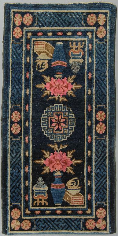 A rug, semi-antique, Baotou, ca 129 x 66 cm.